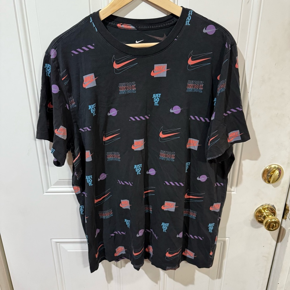 Nike Men's Black Tee with Red and Purple Patterns